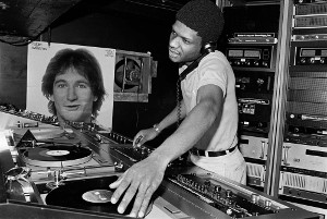 Larry Levan behind the turntables at Paradise Garage
