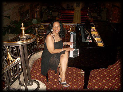 Donna McGhee playing the piano